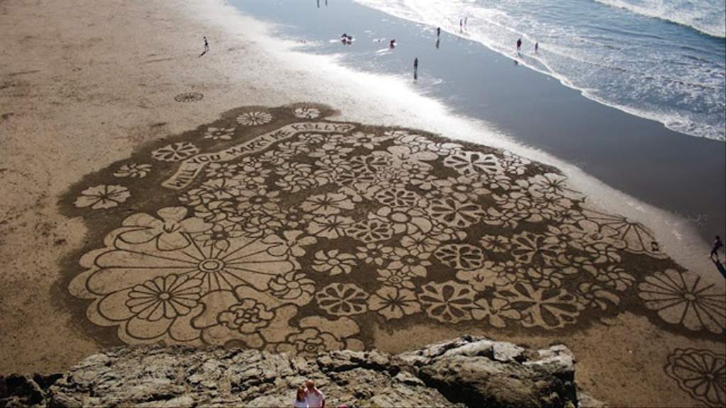 Artist Creates Large Scale Sand Art Concrete Playground