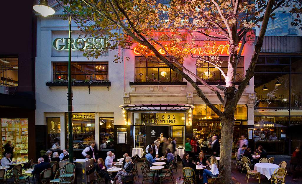 Grossi Florentino exterior with people eating outside on the street - home to some of the best pasta in Melbourne