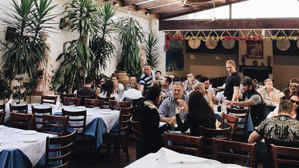 People eating at Jim's Greek Tavern in Melbourne
