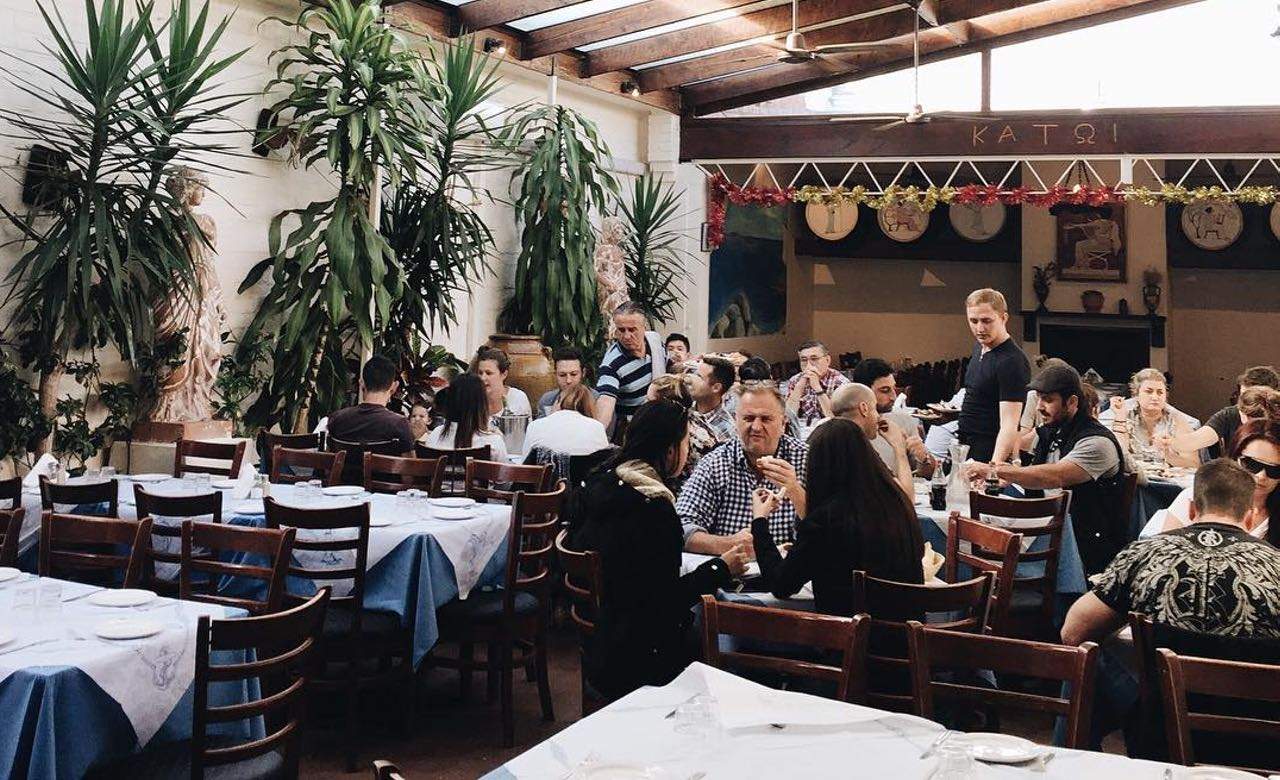People eating at Jim's Greek Tavern in Melbourne