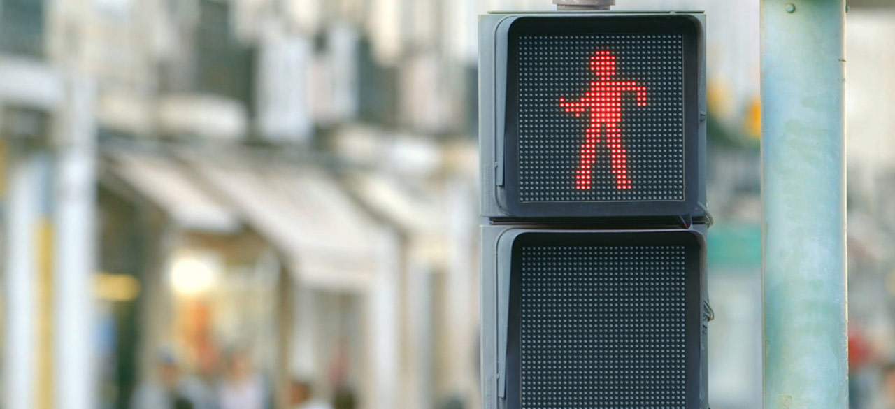 This Dancing Red Light Man Could Stop Pedestrians Walking into Traffic