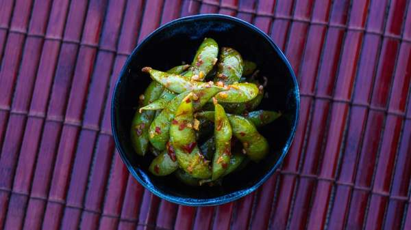 a bowl of edamame beans at raw bar by bondi beach