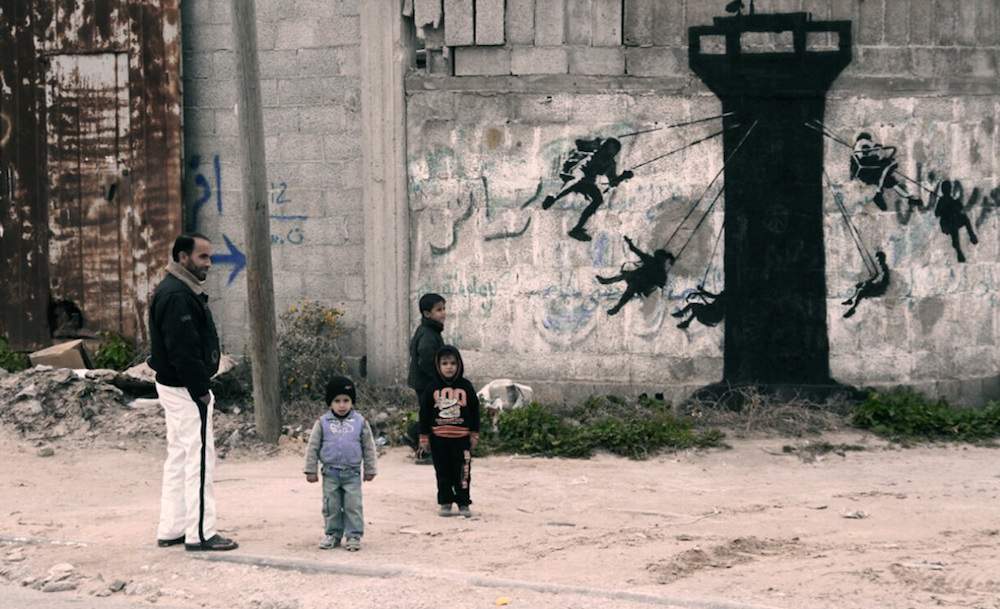 Banksy Just Visited Gaza and Came Back with This Dark Tourism Ad