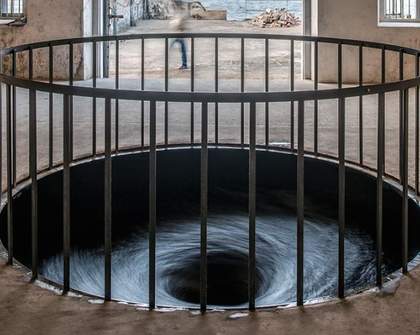Anish Kapoor Creates Hypnotic Black Water Vortex in Gallery Floor