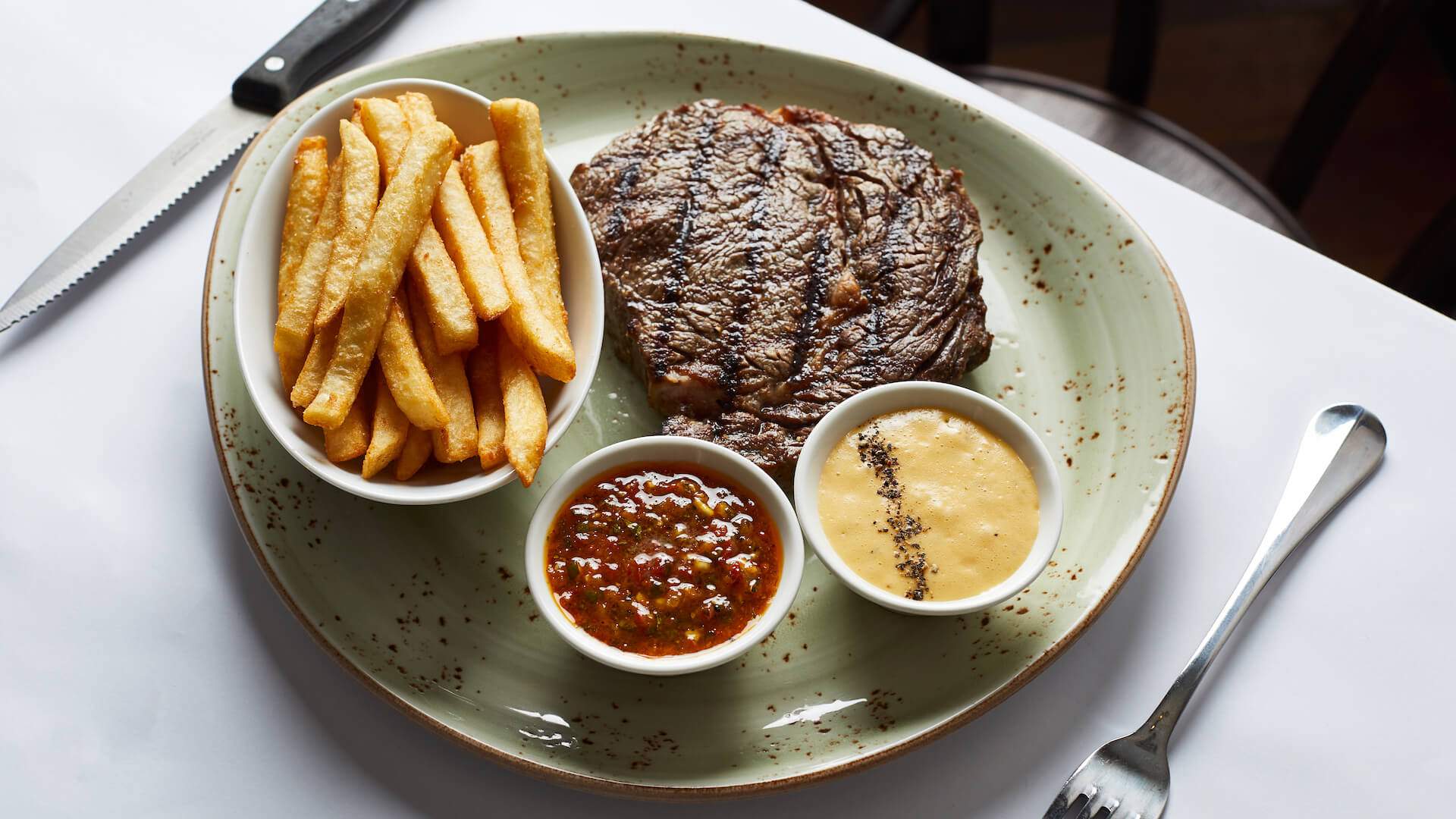 Steak and fries at L'hotel Gitan - home to some of the best steak in Melbourne