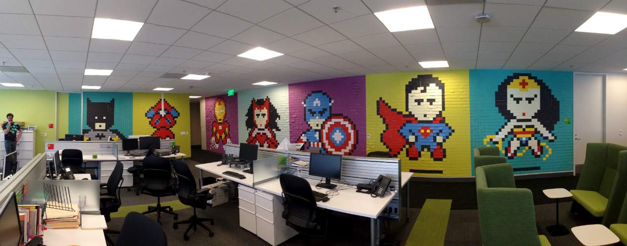 This Legend Spruced Up His Workplace with an 8-Bit Superhero Post-It Mural