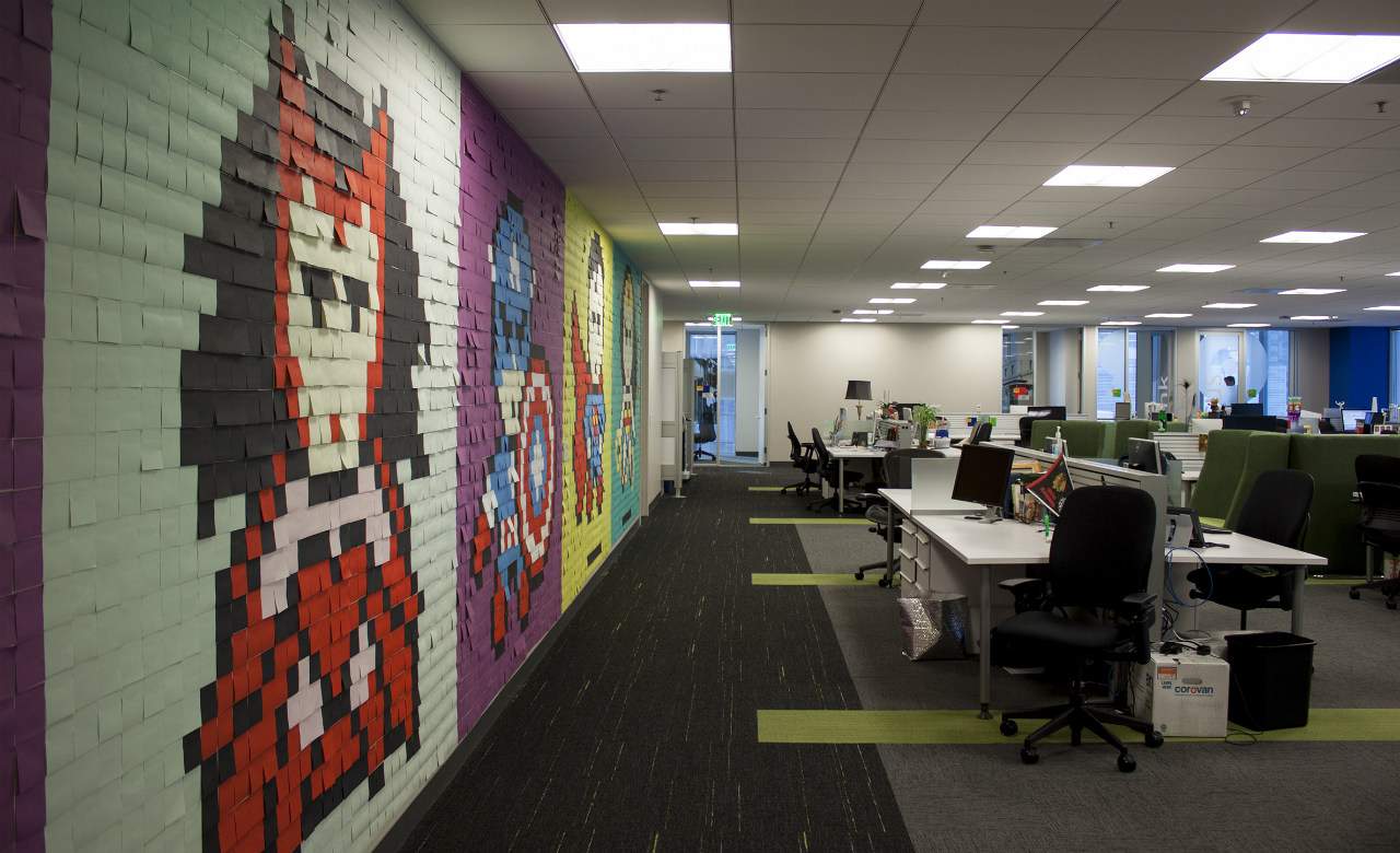 This Legend Spruced Up His Workplace with an 8-Bit Superhero Post-It Mural
