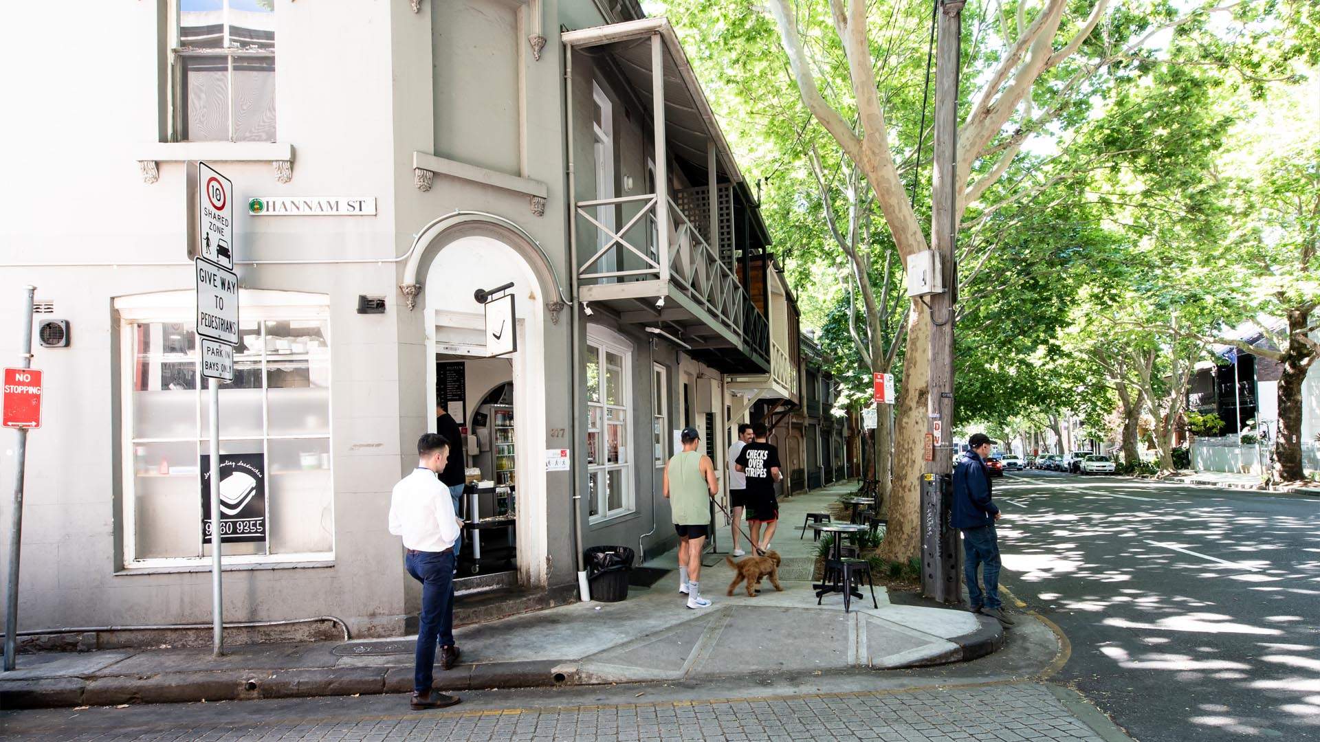 People standing out the front of South Dowling Sandwiches in Darlinghurst.