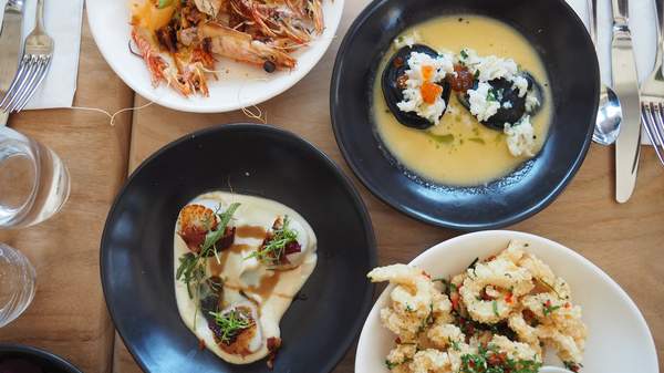 A selection of dishes at The Herring Room - one of the best seafood restaurants in Sydney.