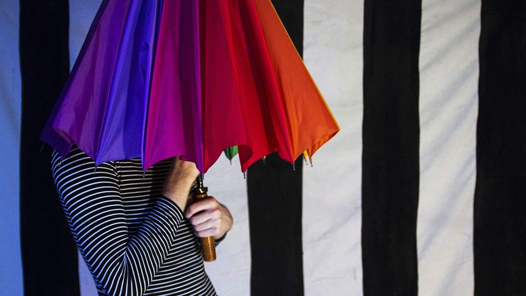 The Boy with the Rainbow Umbrella