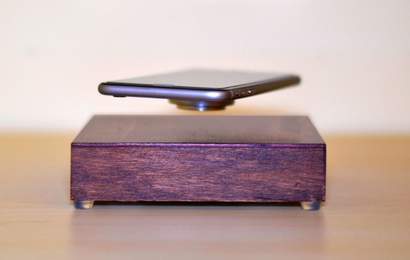 Background image for This Wireless Charger Will Magically Make Your Phone Levitate While It Charges It