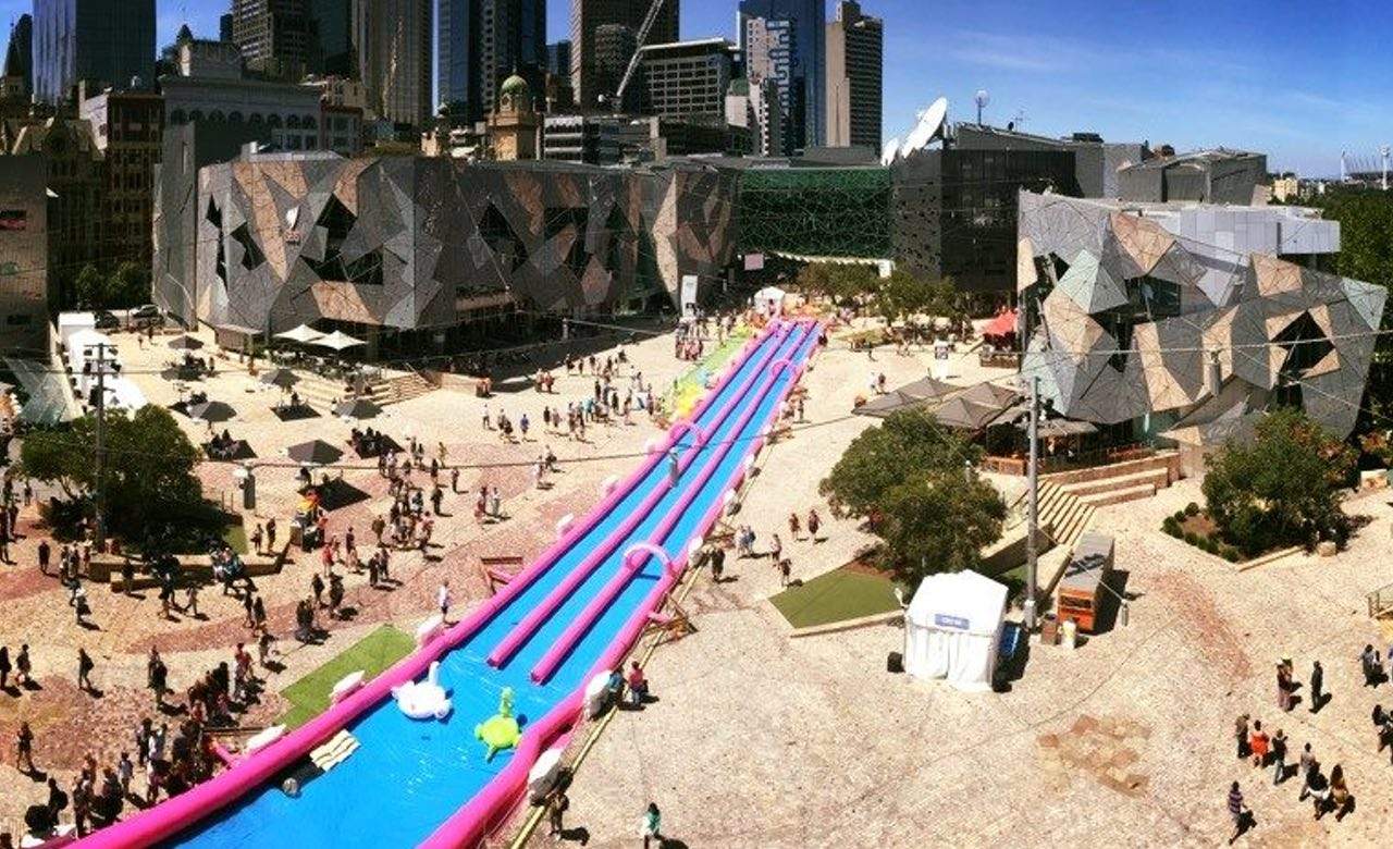 Melbourne's Giant Waterslide Is Returning to Federation Square for Summer