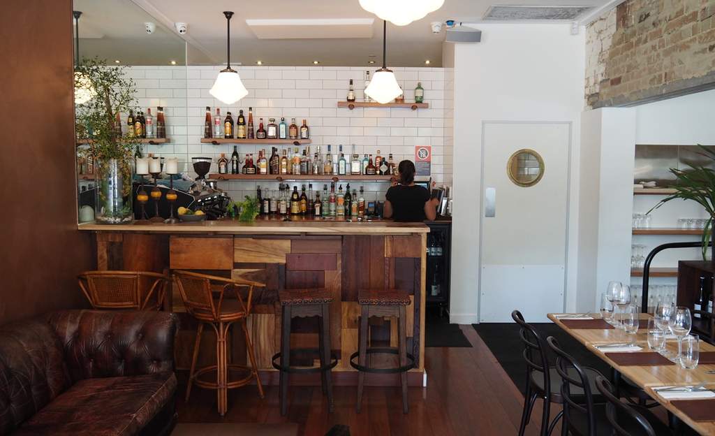 The main bar and dining room at The Herring Room - one of the best seafood restaurants in Sydney.