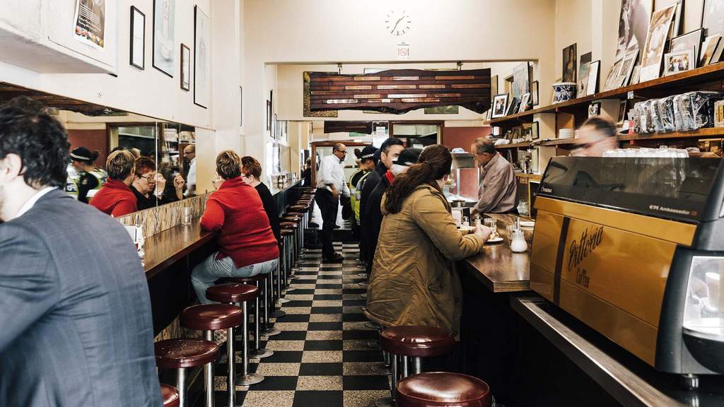 Lots of people eating at pellegrini's - one of the best cafes in Melbourne