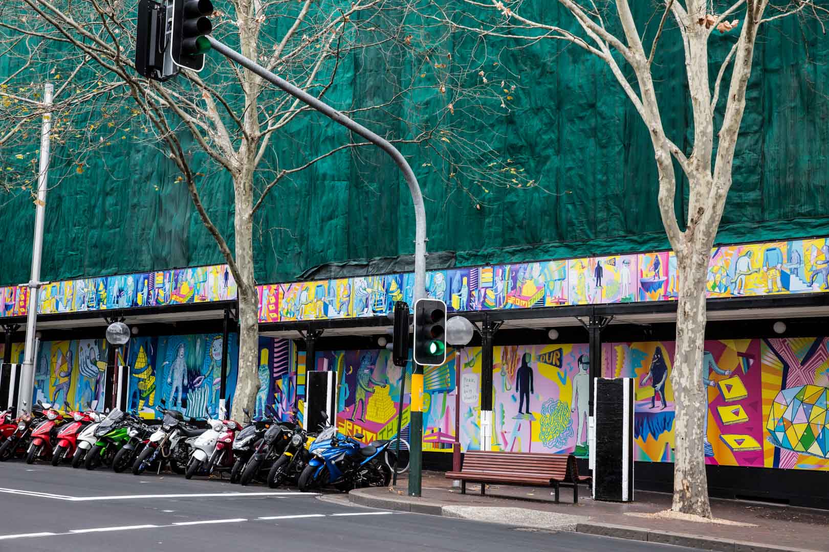 This Is the New Street Art Brightening up Building Sites Across Sydney's CBD
