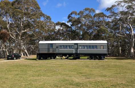 This NSW Farm Lets You Stay in a Luxe Restored Train Carriage Among the Gumtrees