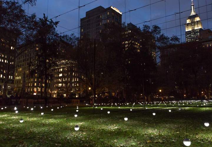 Background image for New York's Madison Square Park Has Been Turned Into a Glowing Field of Light