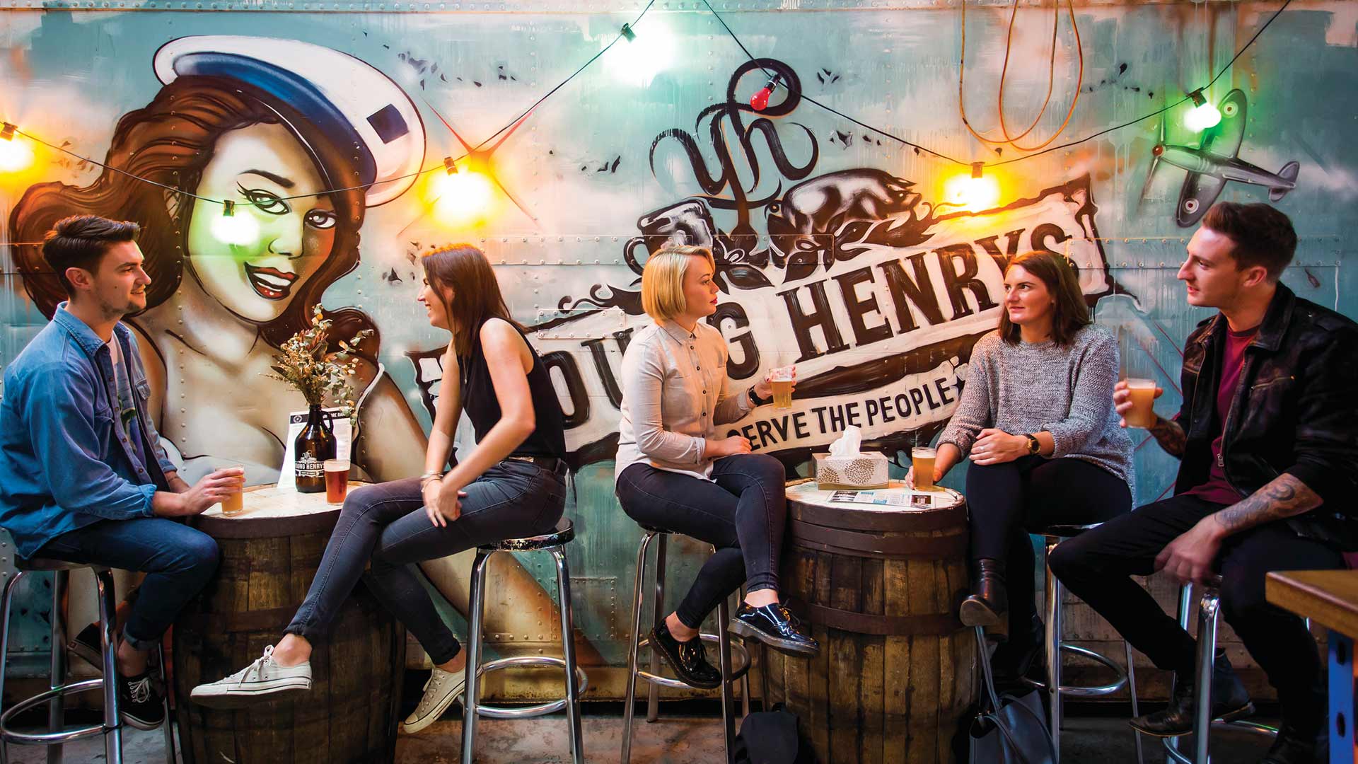 People drinking at Young Henrys brewery bar in Sydney.