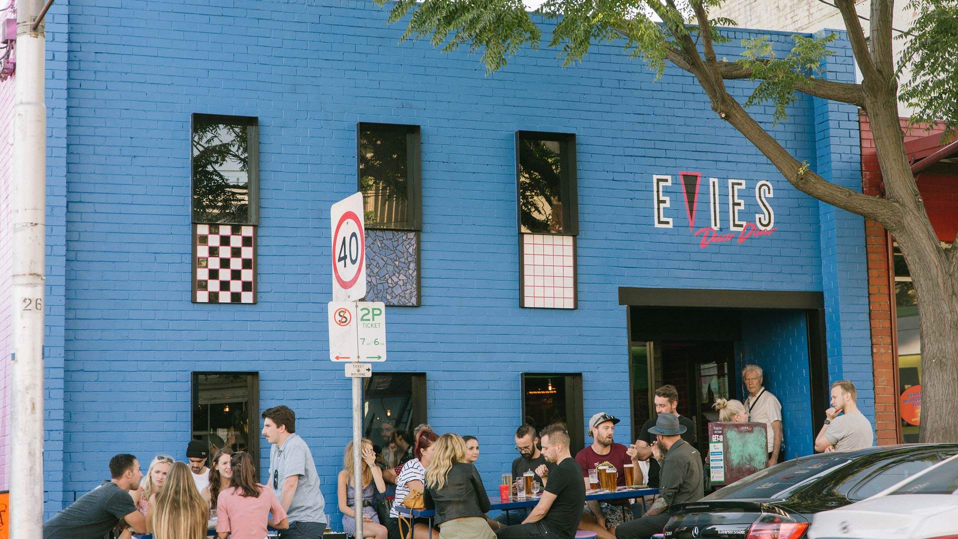 A group of people drinking outside Evies Diner in Fitzroy - near Smith Street