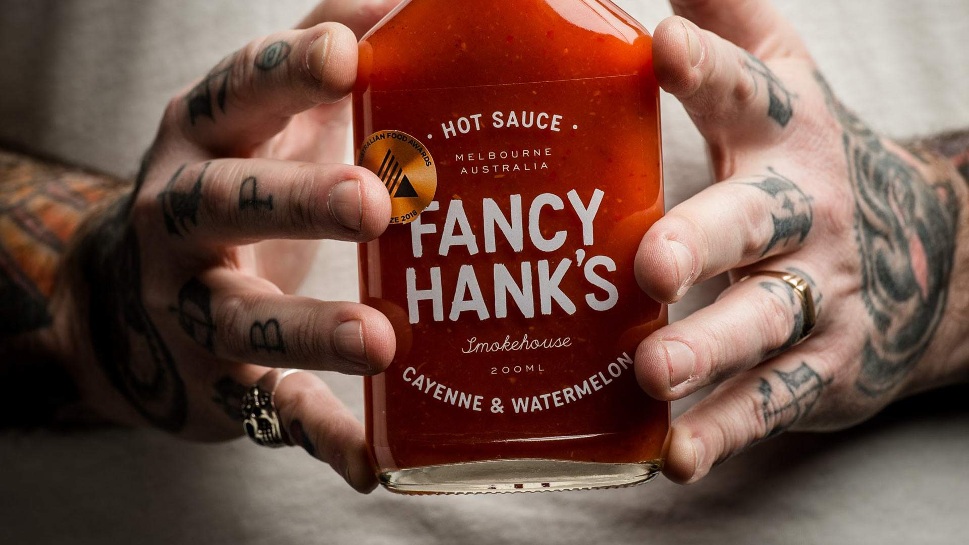 Barbecue Legend Fancy Hank's Has Just Dropped a Line of Take-Home Hot Sauces