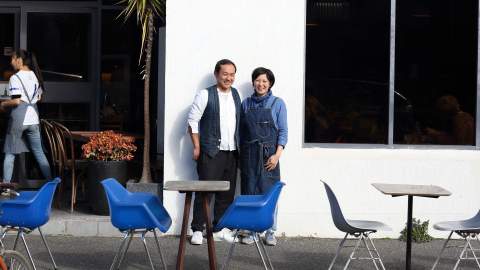 Owners Meg and Zenta Tanaka standing outside Cibi cafe in Collingwood.