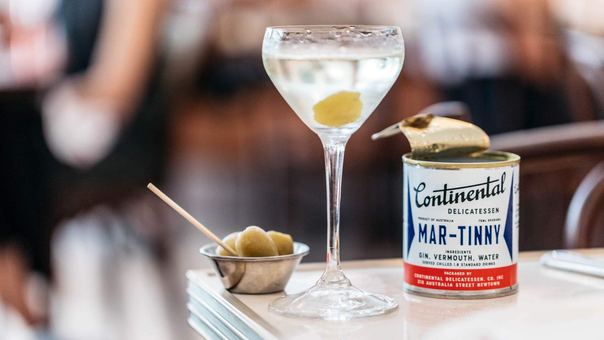 a martini with olives poured from a can - best bars in Sydney - continental deli newtown