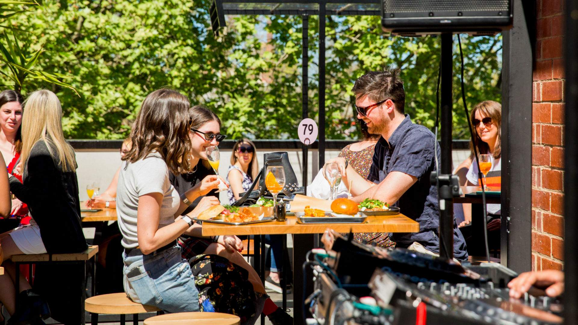 Friends enjoying brunch on a rooftop