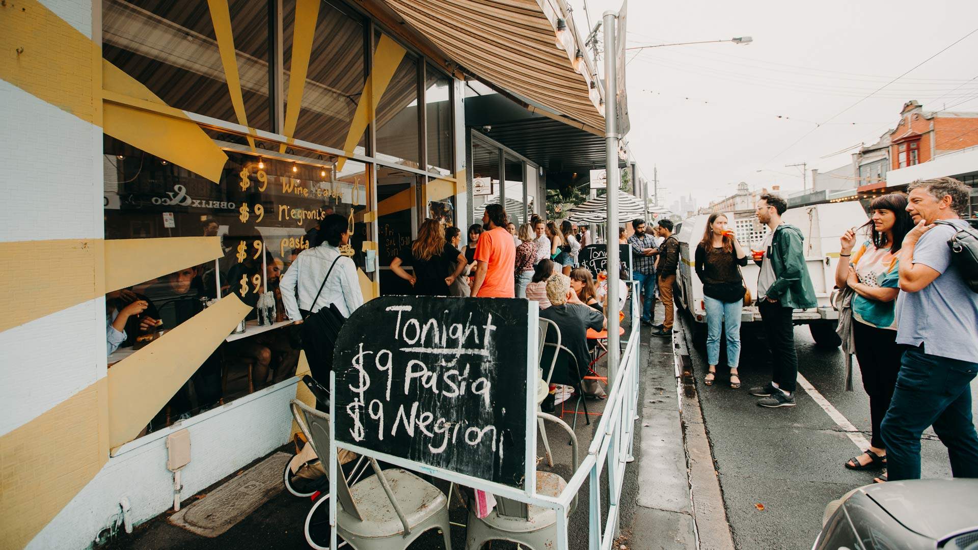 the exterior of Good Times with stacks of people waiting outside to get in - home to some of the best pasta in melbourne, also some of the cheapest pasta in melbourne