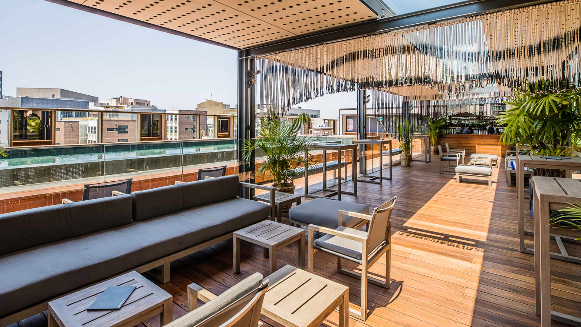 The Old Clare Hotel's Rooftop Poolside Bar Has Reopened to the Public ...
