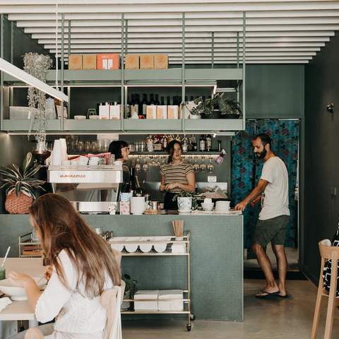 Sister of Soul cafe full of people drinking and eating vegan food