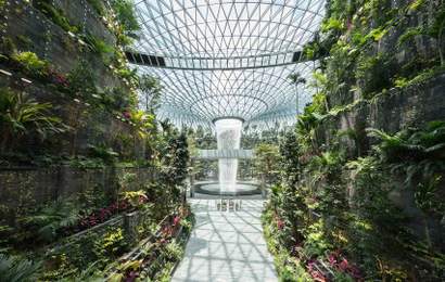 Background image for The World's Tallest Indoor Waterfall Is Now Open Inside Singapore's Changi Airport