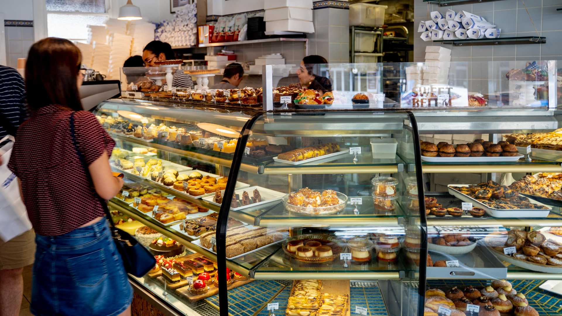 The counter at Sweet Bedlem - full of cakes and pastries - home to some of the best donuts in sydney