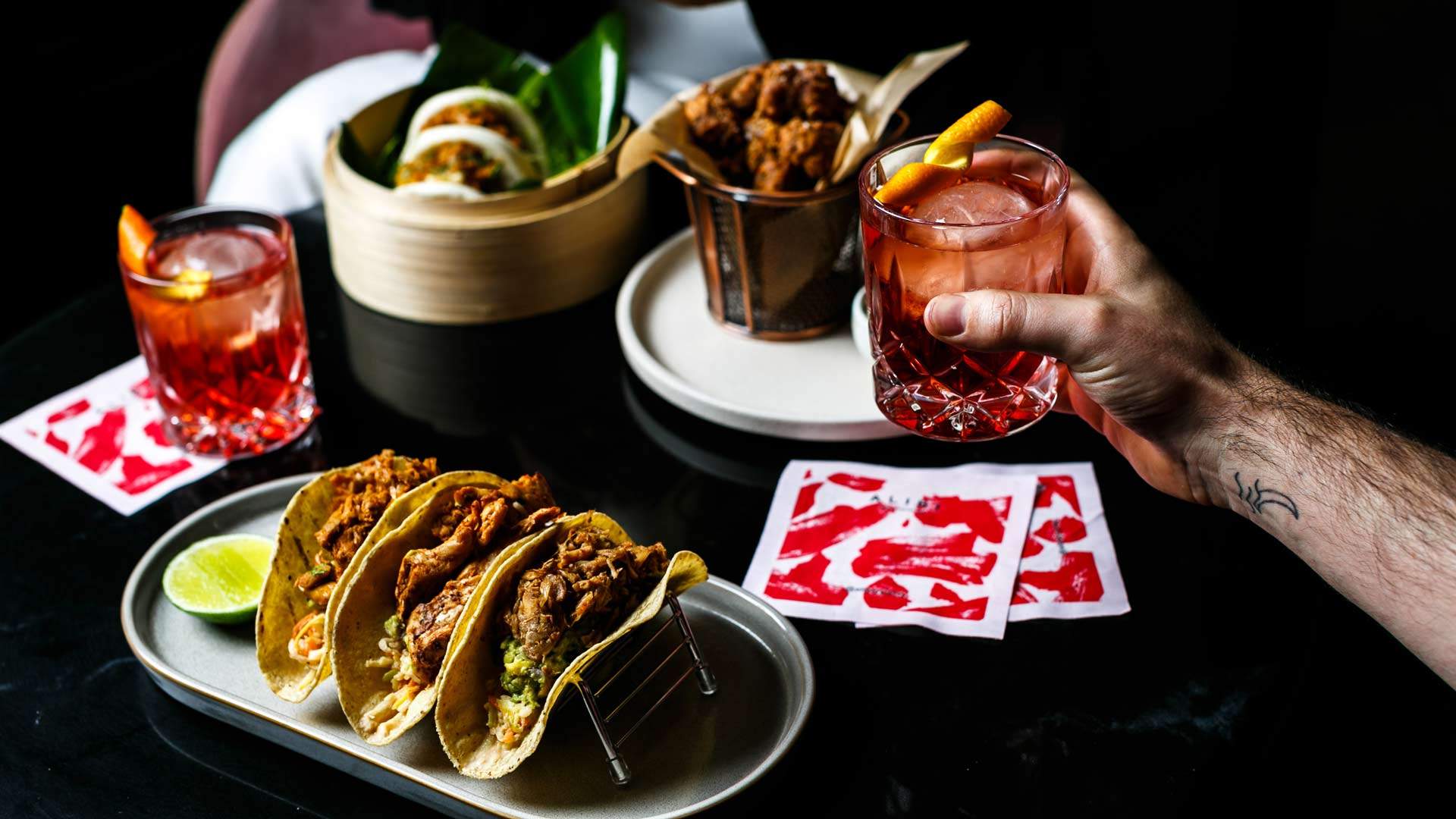 A selection of vegan tacos and cocktails in Sydney vegan restaurant — Alibi Bar and Kitchen