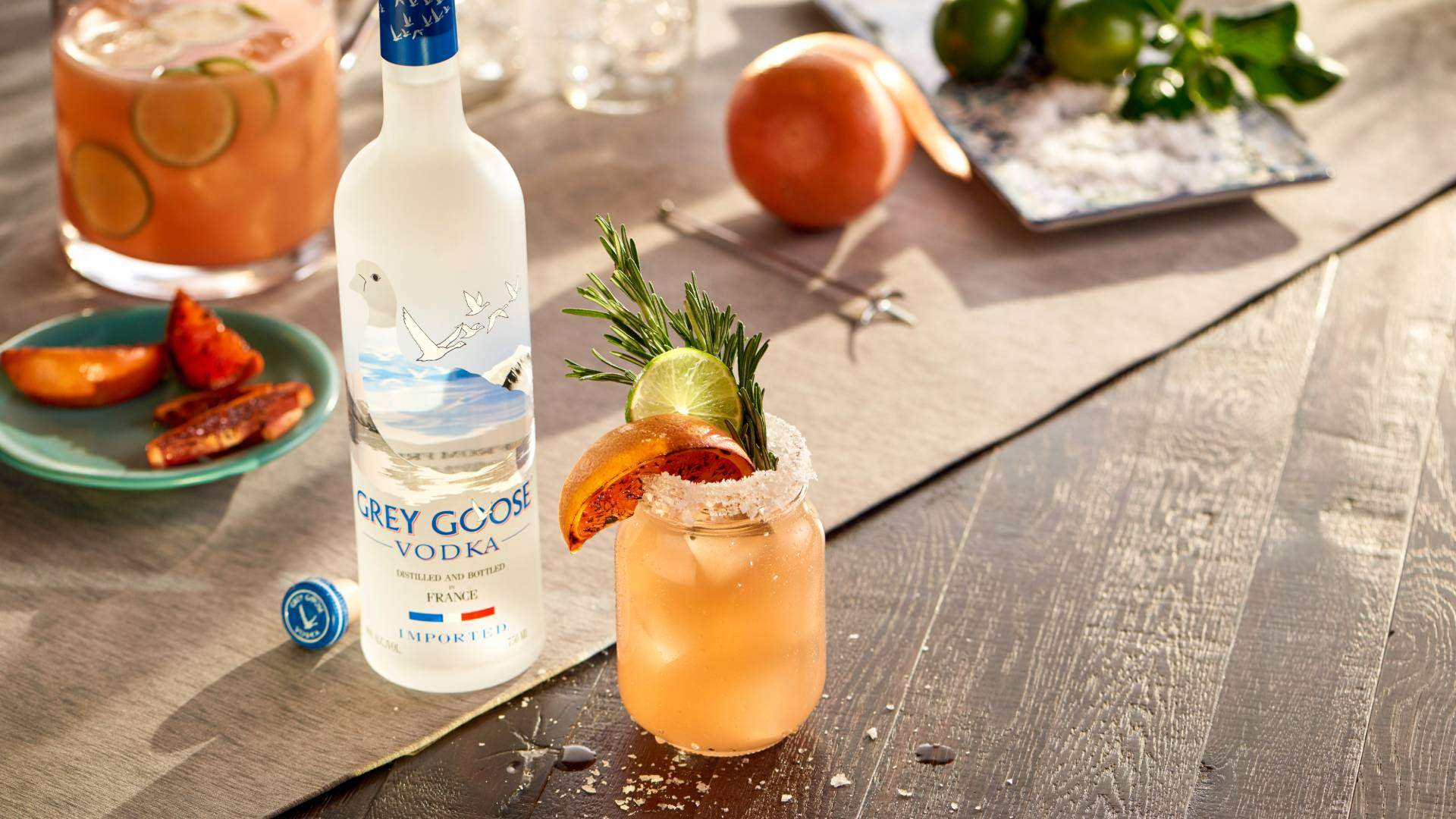 Cocktail and bottle of Grey Goose