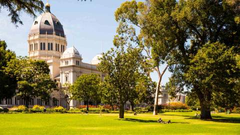 People relaxing on the grass at Carlton Gardens