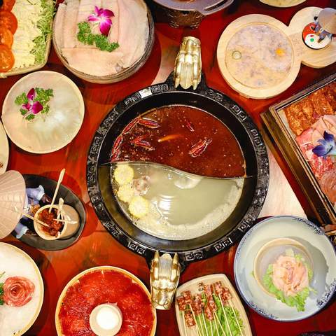 A table full of hot pot essentials at Panda Hot Pot - one of the best hot pots in Melbourne