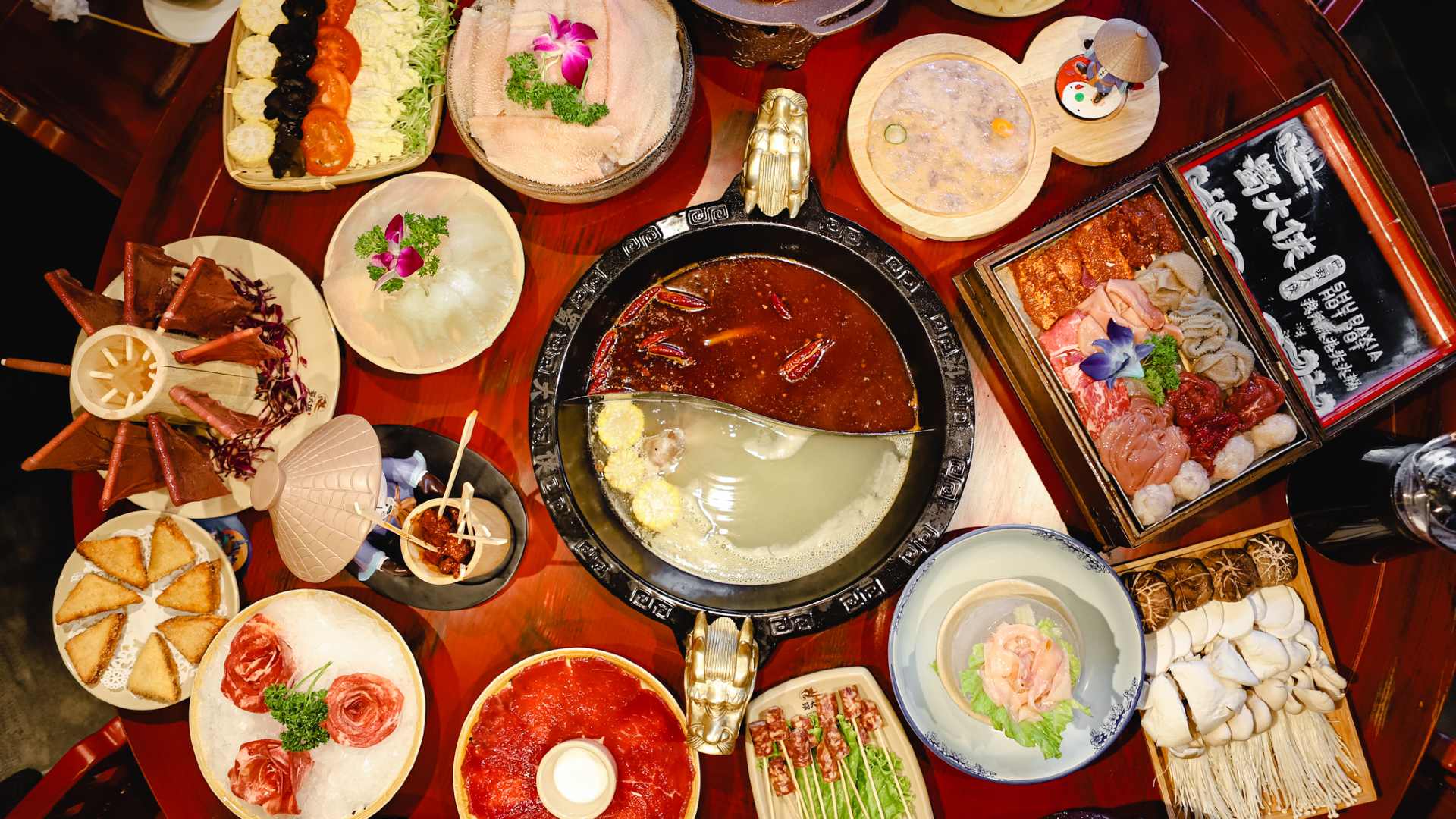A table full of hot pot essentials at Panda Hot Pot - one of the best hot pots in Melbourne