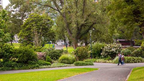 People walking through Flagstaff Gardens