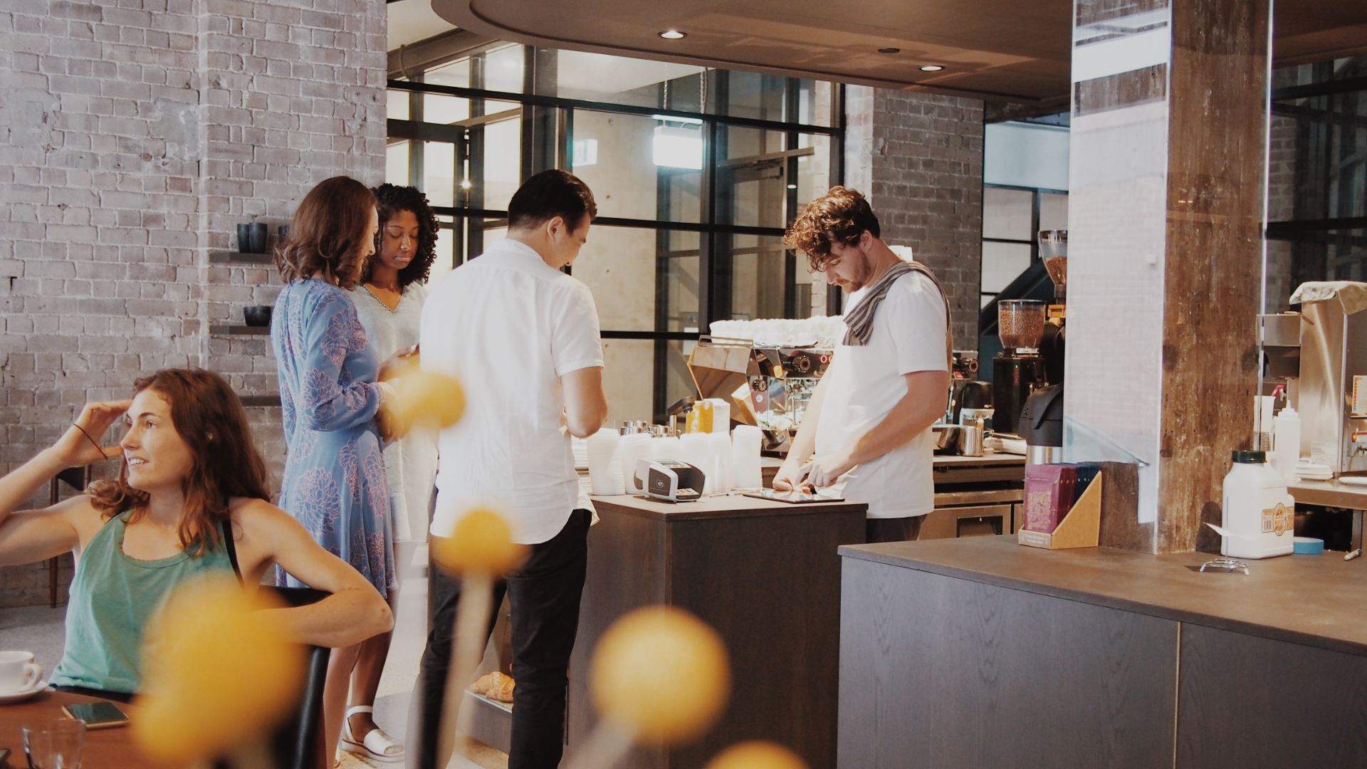 Someone ordering at Old Gold - - one of the best cafes in Sydney