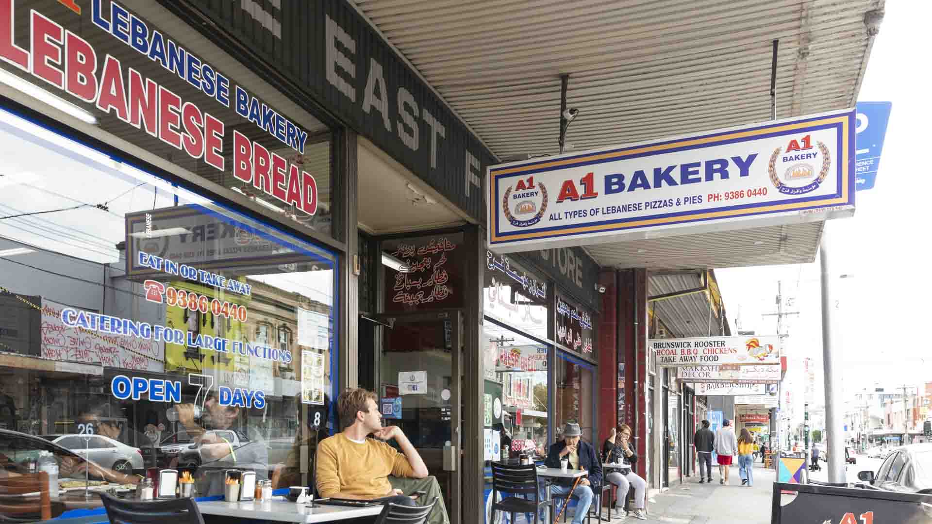 People sitting out the front of A1 Bakery on Sydney Road in Brunswick - - one of the best cafes in Melbourne