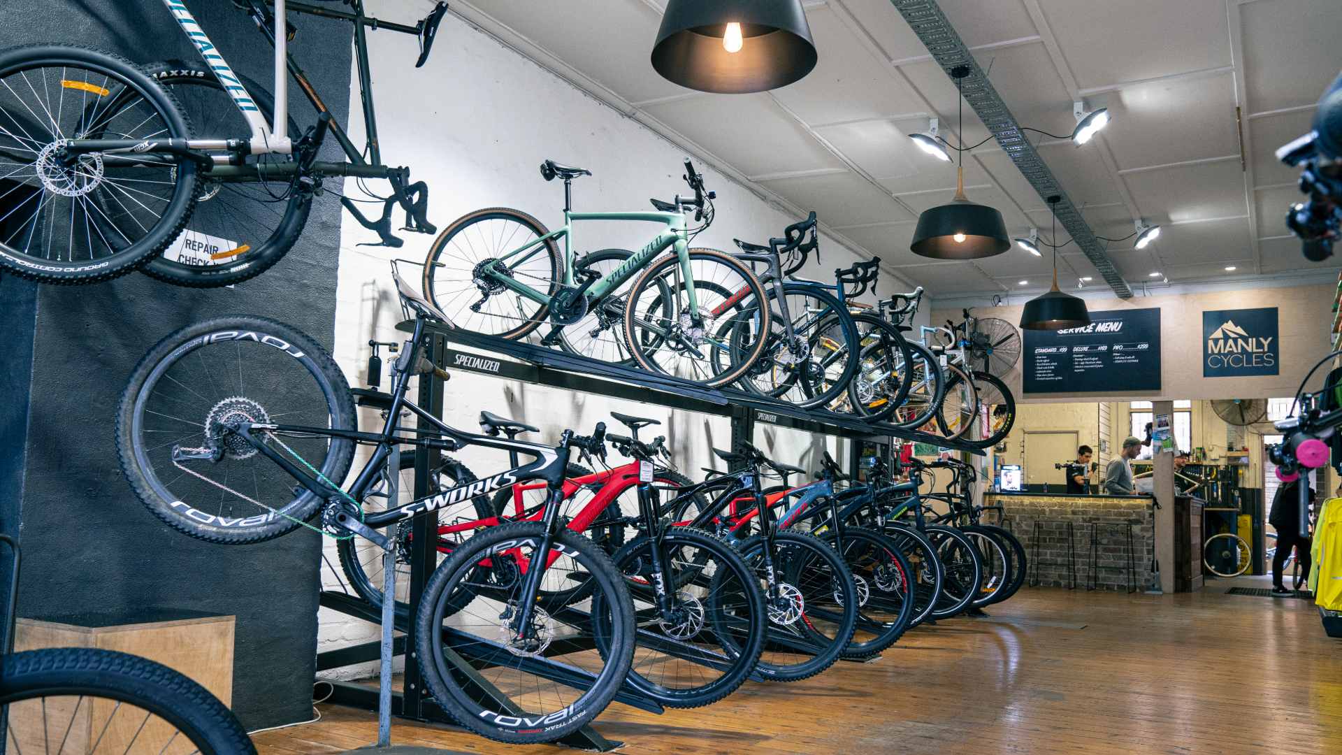 Bikes in a row in Manly bike shop