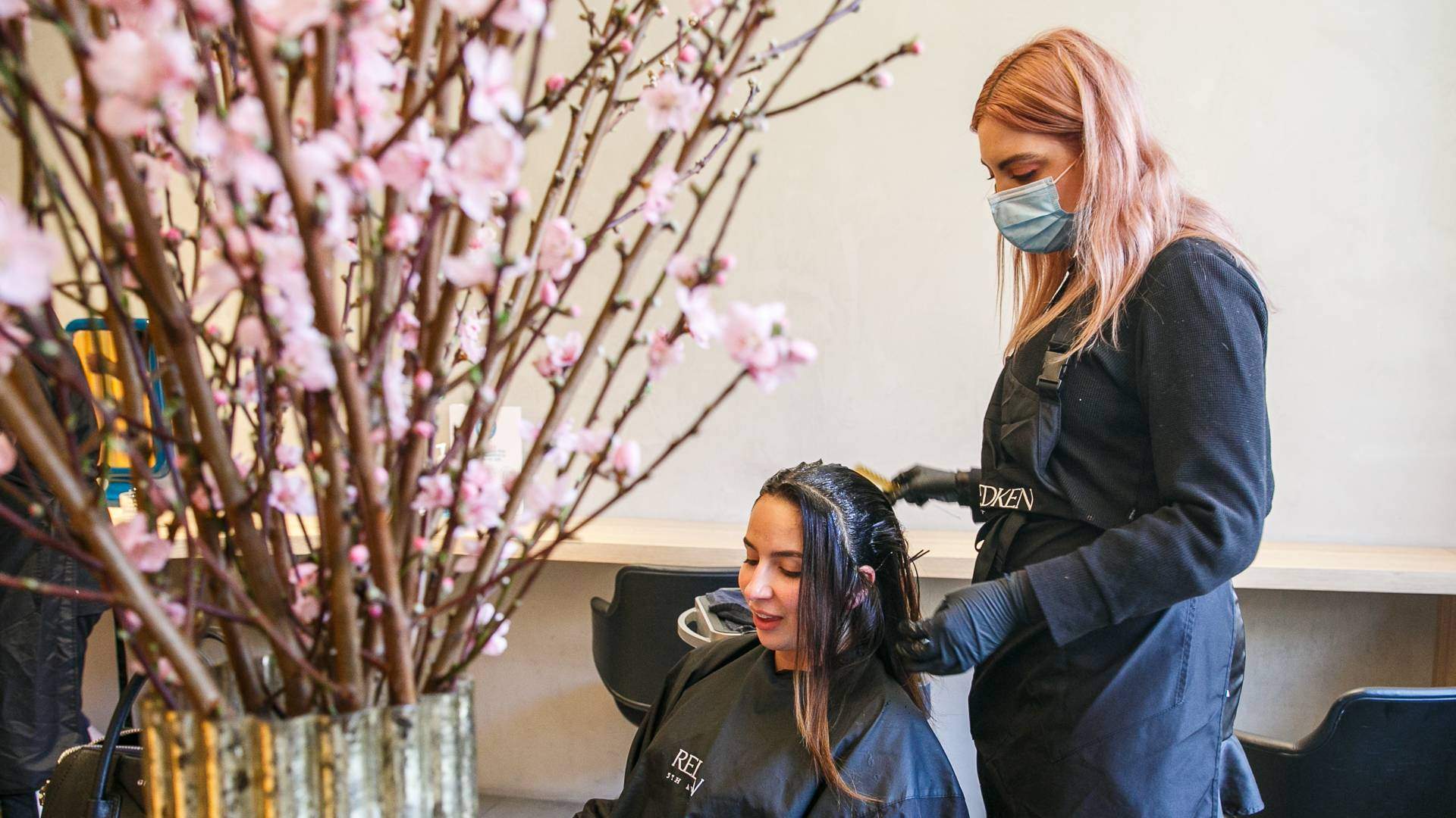 Hairdresser and customer during an appointment