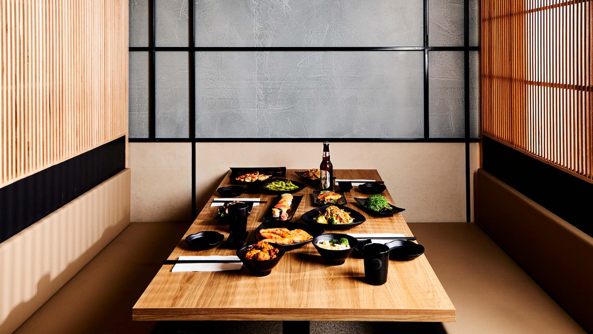 a table full of japanese food at Okami Marrickville sydney
