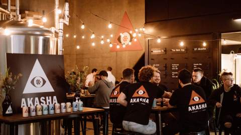 People drinking at Akasha Brewery.