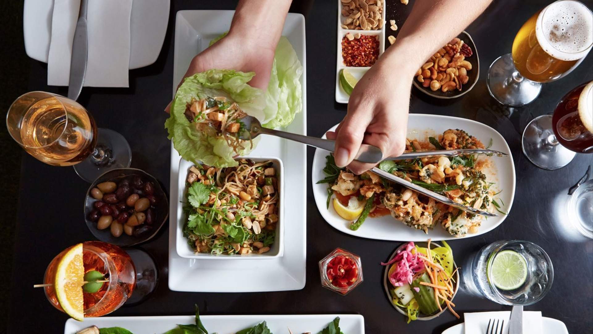 Yulli's Surry Hills - table full of vegetarian dishes being eaten