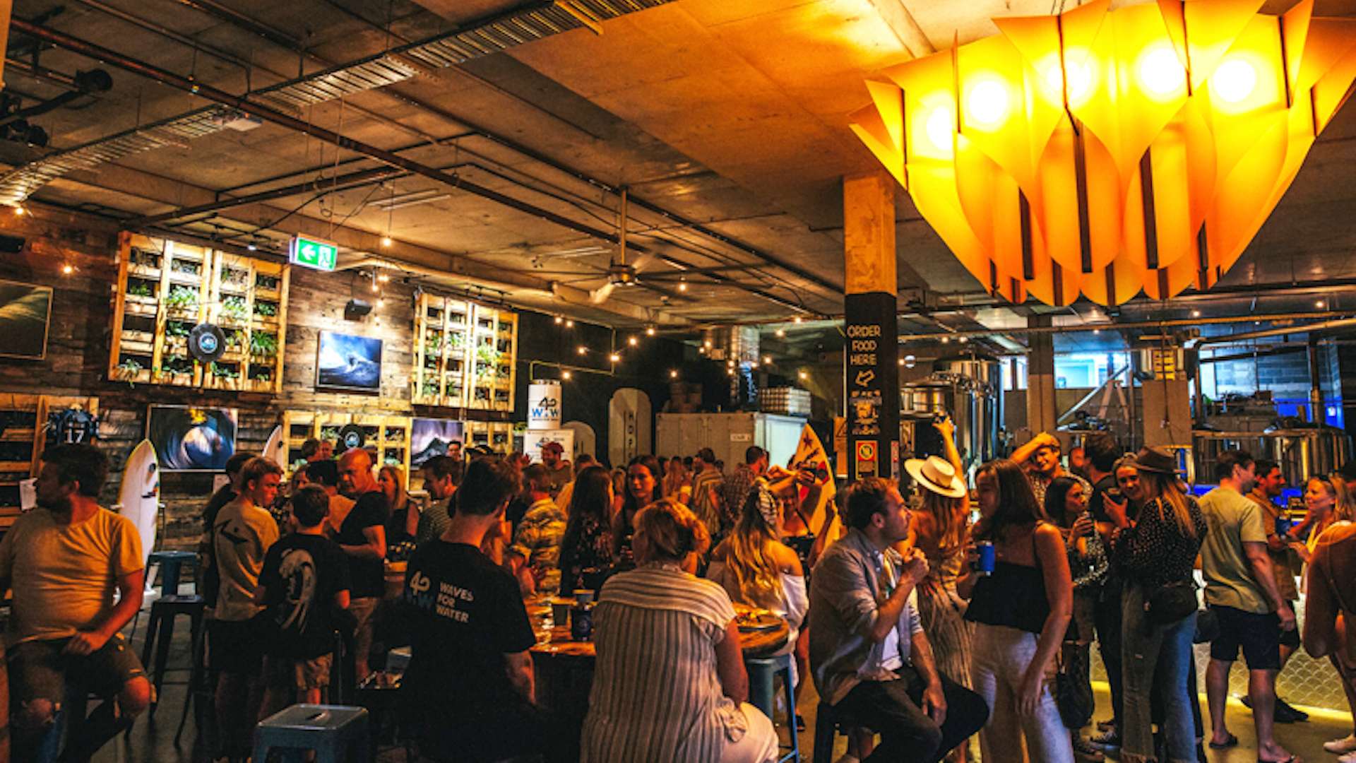 The busy bar at 7th Day Brewery in Sydney.