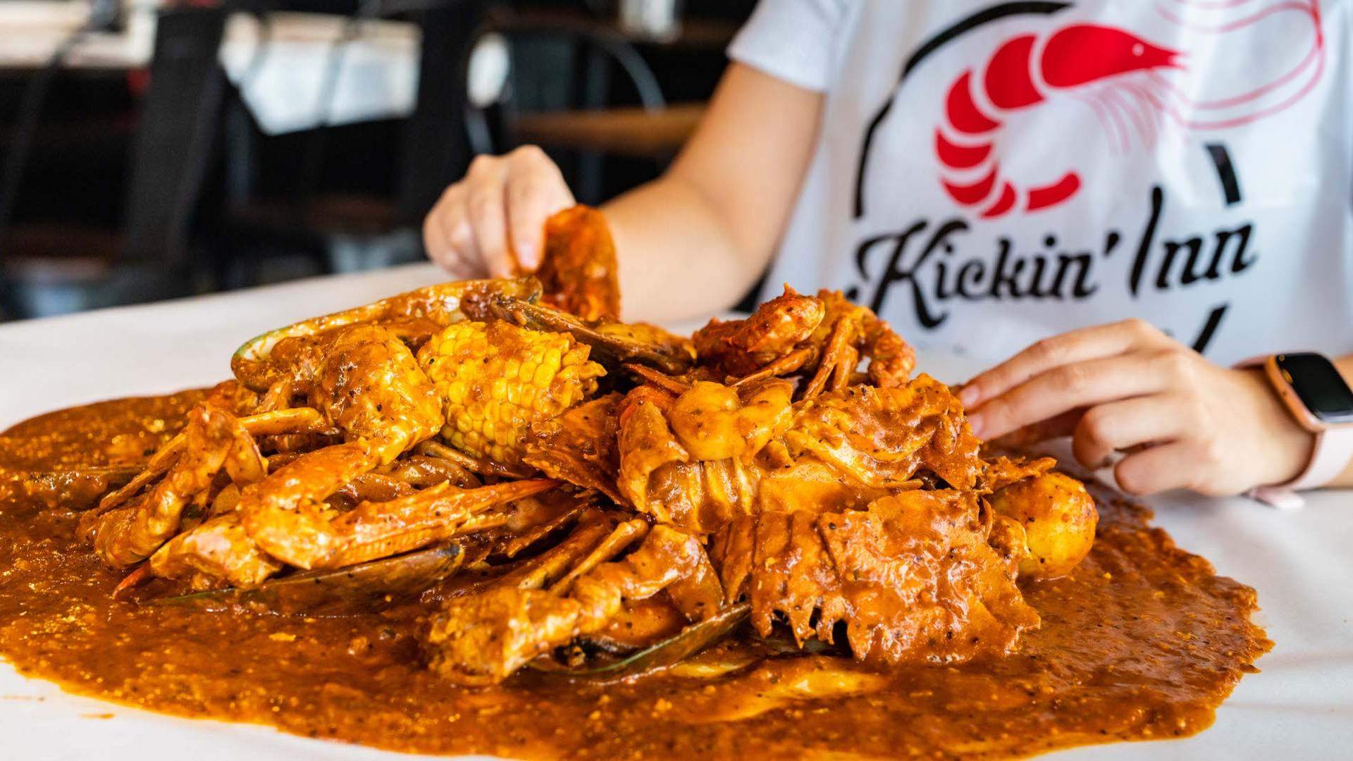 a bag of seafood at Kickin'Inn Port Melbourne