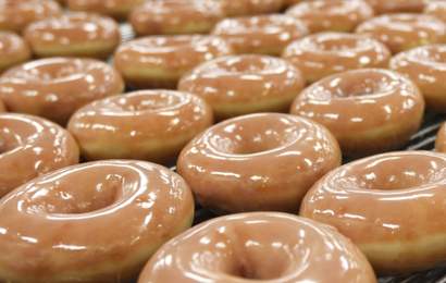 Background image for Krispy Kreme Is Giving Away an Excessive 100,000 Free Doughnuts
