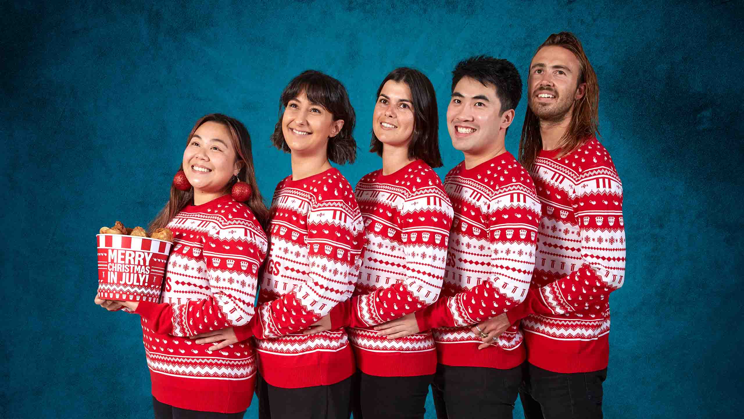 KFC's New Christmas in July Sweater Is Exactly What You Need to Wear While Eating Fried Chicken