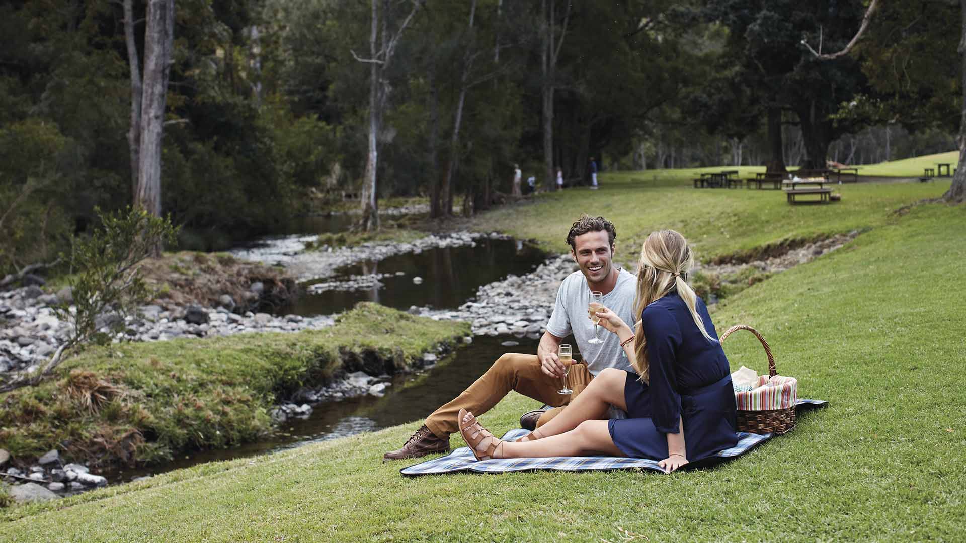 A couple picnicking in Canungra Valley